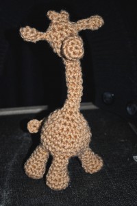 giraffe crocheted from synthetic yarn- he stands on his own!